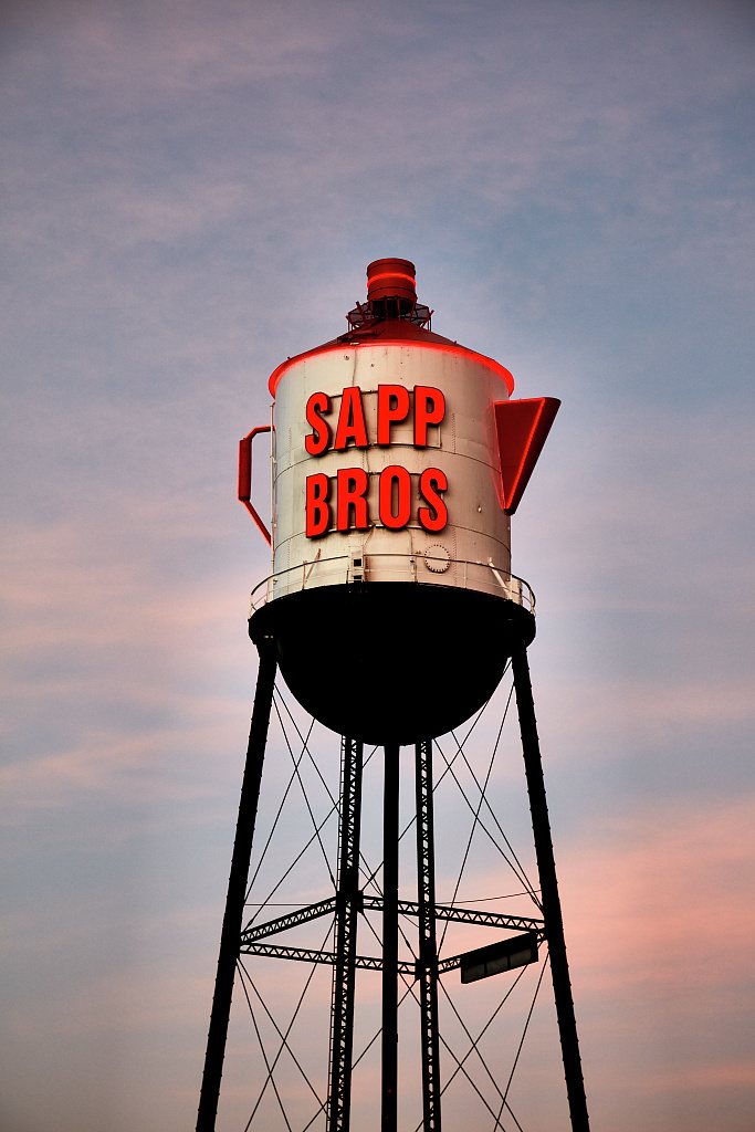 The Sapp Bros truck stop sign at dusk, Nebraska